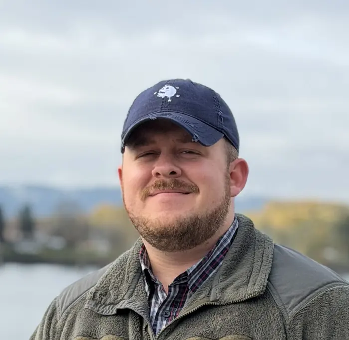Portrait of Adriel by a lake