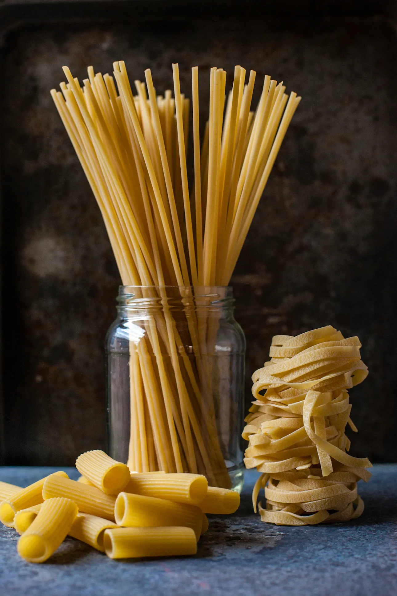 Three varieties of uncooked dry pasta